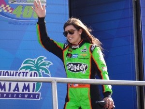 Danica Patrick waves to fans before the 2013 Ford Eco-Boost 400 at Homestead-Maimi Speedway